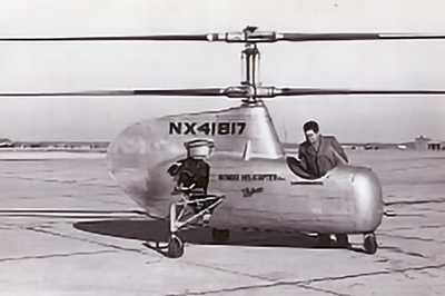 Gessow leaning over the cocpit of an experimental Bendiz Helicopter
