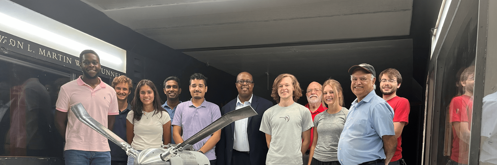 A group of staff, faculty and students in the UMD Wind Tunnel