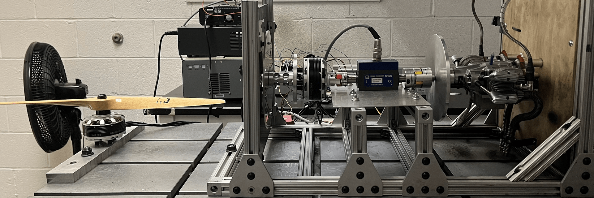 Hybrid-electric test bed with a 4 kW 4-stroke piston engine-generator. 